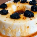 Coconut custard with plum sauce